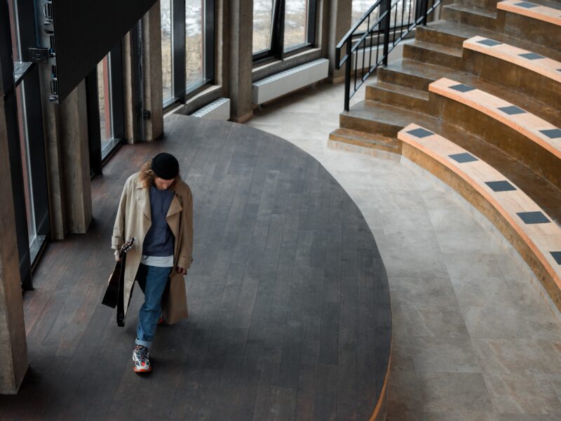 Metaphor of a staging website illustrated by a photograph of a woman on a theatre stage
